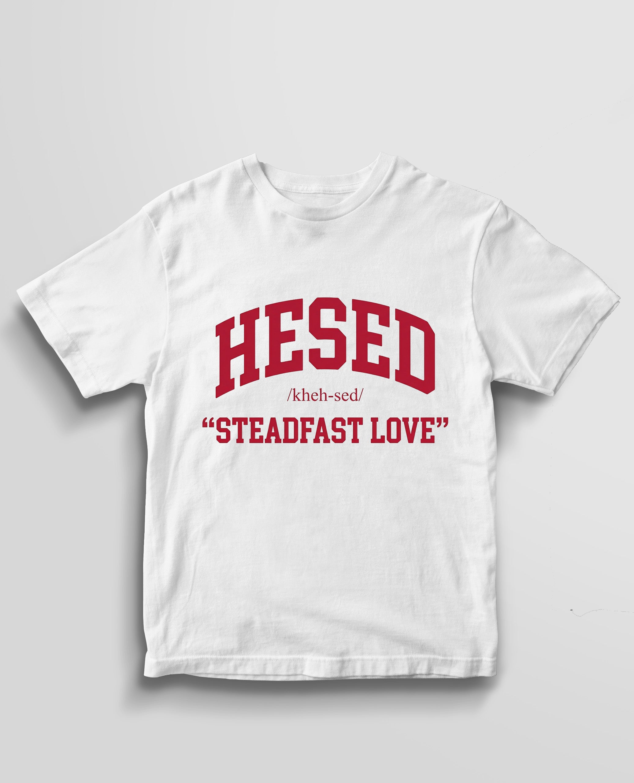 White t-shirt with red text 'HESED /khɛːˈsed/ STEADFAST LOVE' on a light gray background